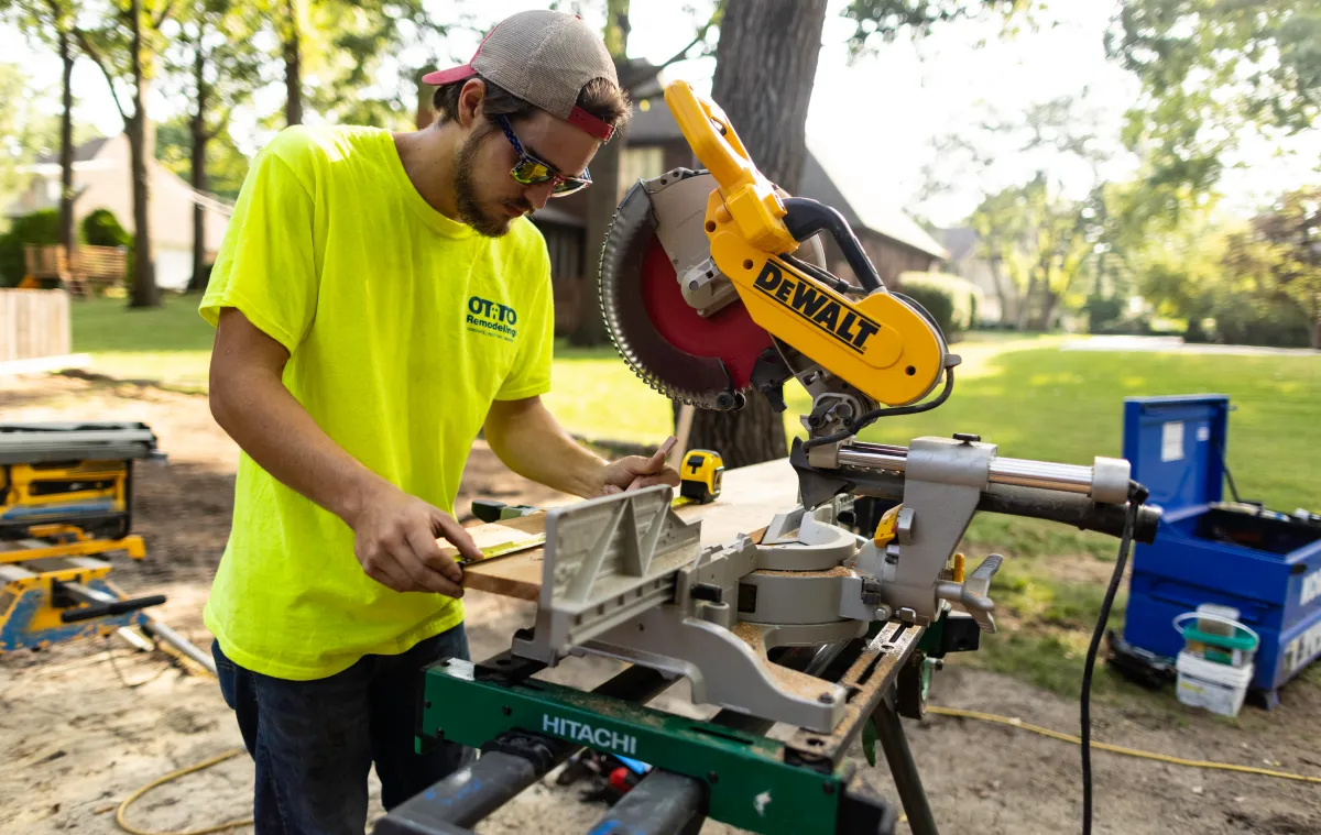 A guy working with a table saw